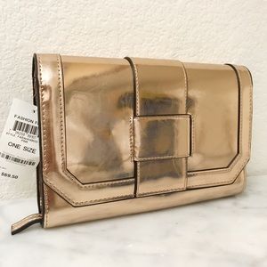 INC INTERNATIONAL CONCEPT METALLIC CLUTCH